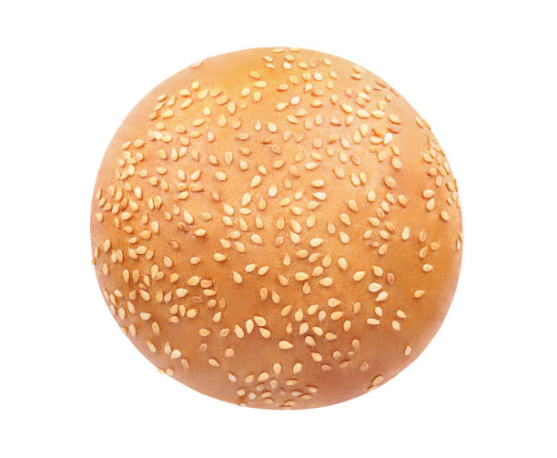 istock Bun sesame round, top view, isolated on white background with clipping path. 1334093980