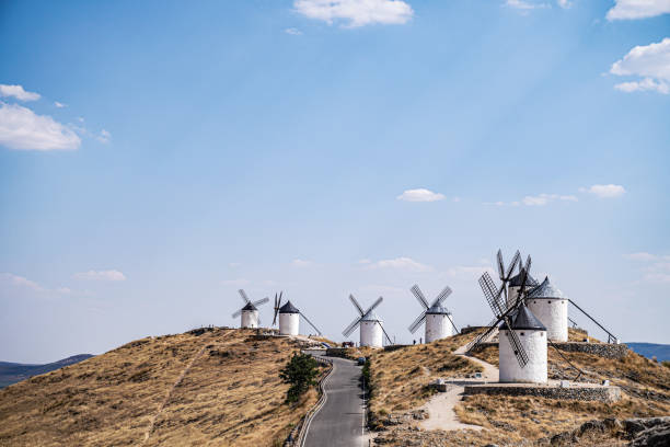 istock Seven windmills in an elevated area of dry pasture 1334094153