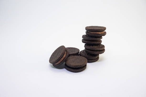 istock Pile of Chocolate Biscuits with light brown cream 1334094512