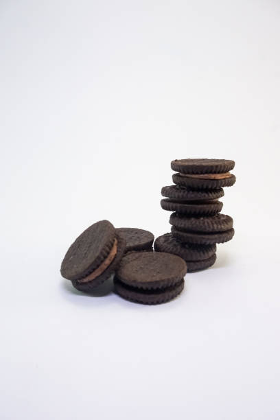 istock Pile of Chocolate Biscuits with light brown cream 1334094540