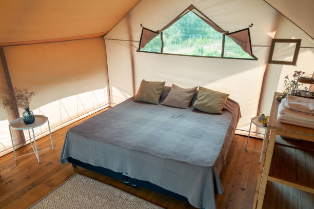 istock Interior of bedroom inside glamping house 1334096736
