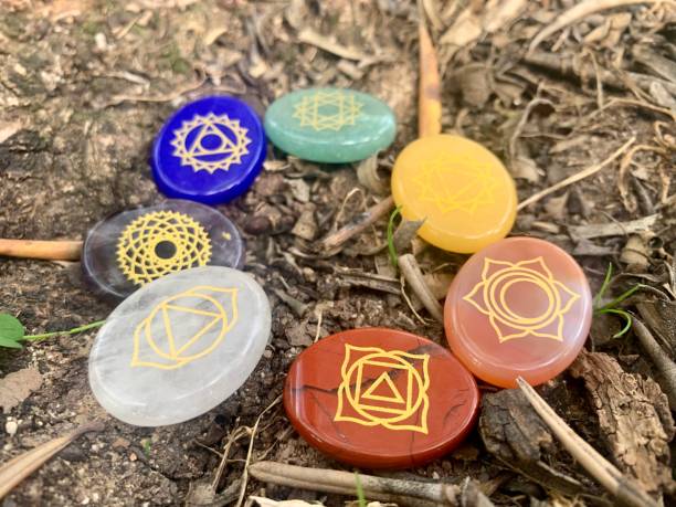 istock Chakras gemstones in ground background 1334097615