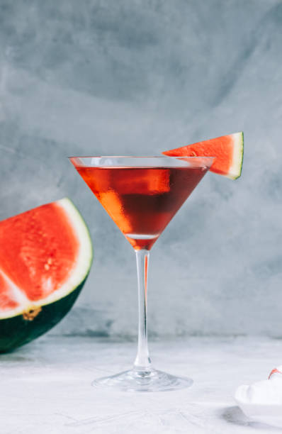 istock Watermelon cocktail in martini glass on the table. Refreshing drink 1334097941