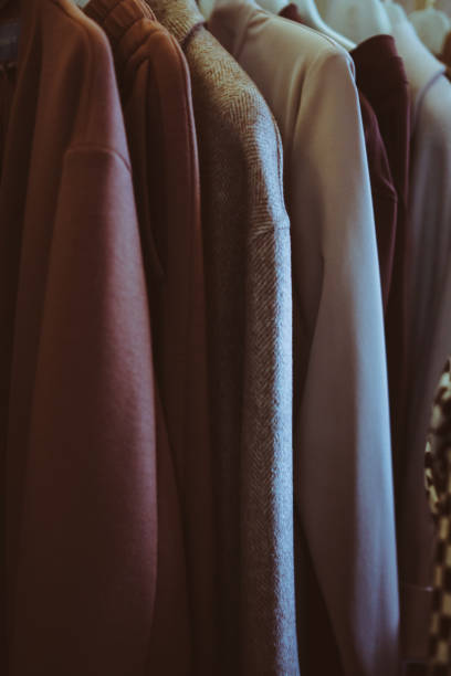 istock Bunch of materials with different brown and beige colours hanging in bunch, clearly visible texture. 1334101869