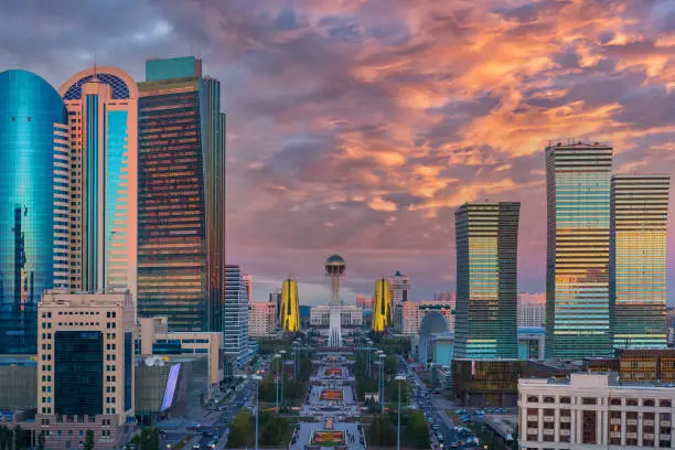 Bird's-eye view of the central part of the capital of Kazakhstan - the city of Nur-Sultan with the residence of the president during a picturesque sunset