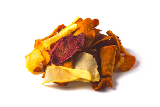 istock Stacked pile of vegetable dried chips isolated 1334102361