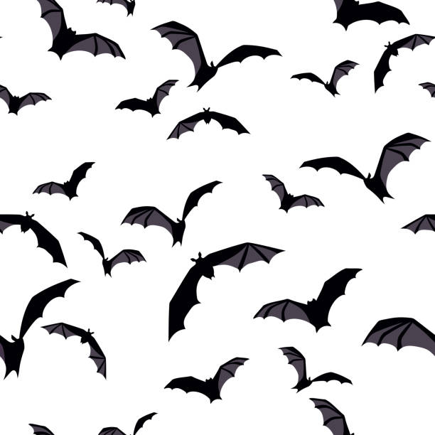 Halloween seamless background with bats on white. Vector illustration. Vector Halloween seamless background with flying bats on white. bat animal stock illustrations
