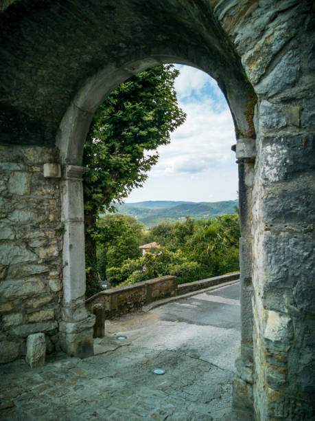 Historic stone gate and a view of the hills