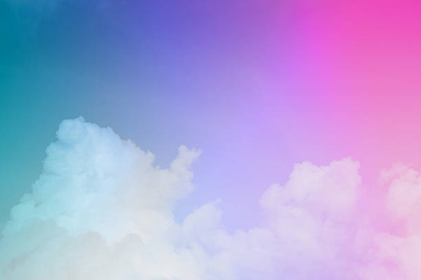 istock beauty abstract sweet pastel soft violet mix blue with fluffy clouds on sky. multi color rainbow image. fantasy growing light 1334109534