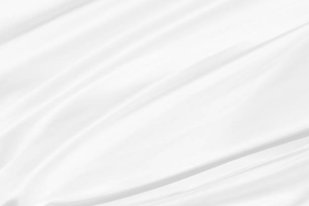 istock Clean fashion woven beautiful soft fabric abstract smooth curve shape decorative textile white background 1334109546