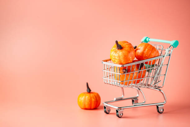 zucche nel carrello - pumpkin small orange holiday foto e immagini stock