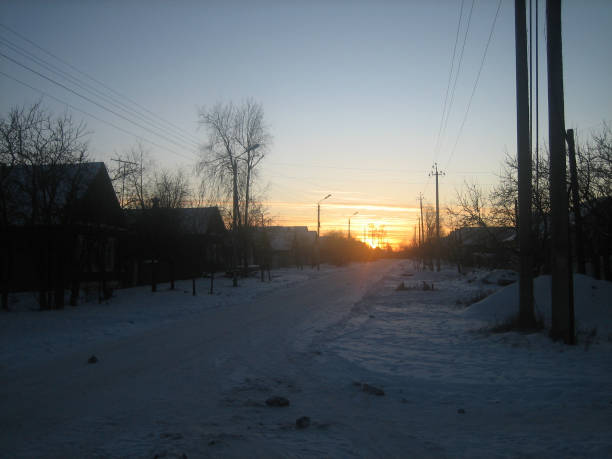 Sunset on a late winter cold evening in a remote Russian village.