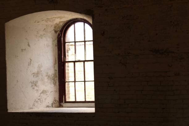 istock A big old window in a dark room 1334121443