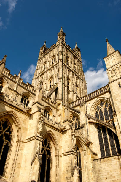 istock Gloucester Cathedral looking up at the tower against a blue sky. 1334121905