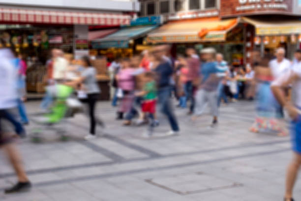 istock Blurred crowd of unrecognizable at the street 1334125435