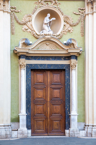 entrance door of a historical building in the city of Nice, France