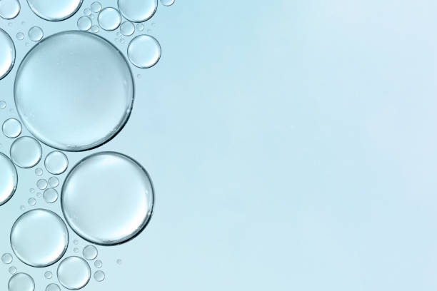 istock serum or cosmetic liquid water bubbles floats drops surface 1334126615