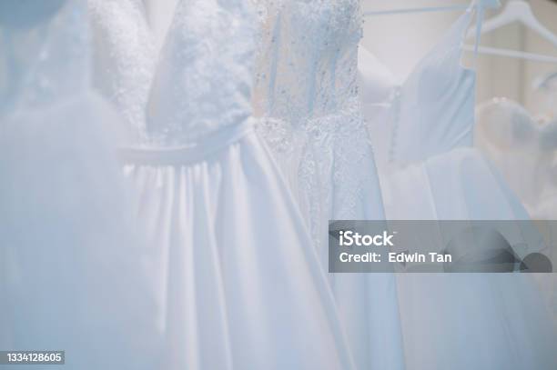 Beautiful Wedding Dresses On A Hanger In Bridal Shop Stock Photo - Download Image Now