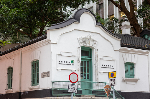 Hong Kong - August 13, 2021 : Old Wan Chai Post Office in Queen's Road East, Wan Chai, Hong Kong. The building is now operated by the Environmental Protection Department as an Environmental Resource Centre.