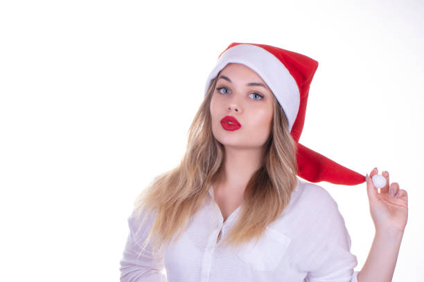girl in santa hat celebrating new year girl in santa hat celebrating new year 12 17 months stock pictures, royalty-free photos & images