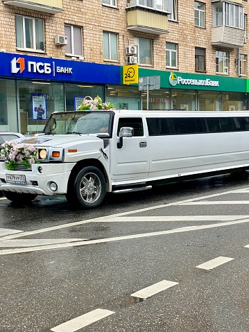 Moscow, Russia - August 12, 2021: White Limousine on Moscow street