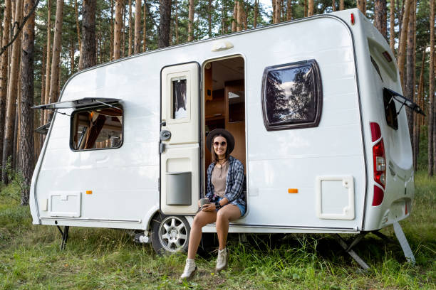 istock Happy young tripper having tea and enjoying summer day 1334140159