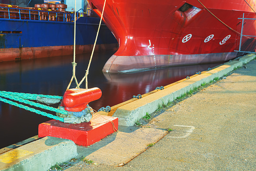 Cable laying ships are docked for resupply at night. Long exposure.