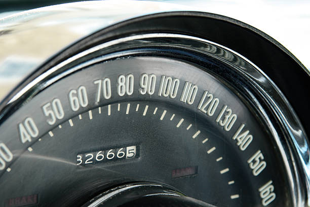 Odometer Odometer of a vintage car Chevi/Corvette from fifty something 100 mph stock pictures, royalty-free photos & images