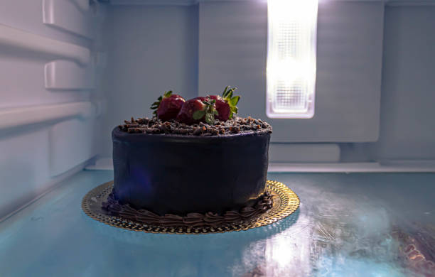 istock closeup black forest chocolate cake with strawberries in the fridge 1334152081