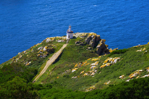 Islas Cies islands lighthouse Faro da Porta in Vigo Islas Cies islands lighthouse Faro da Porta in Vigo Spain vigo stock pictures, royalty-free photos & images