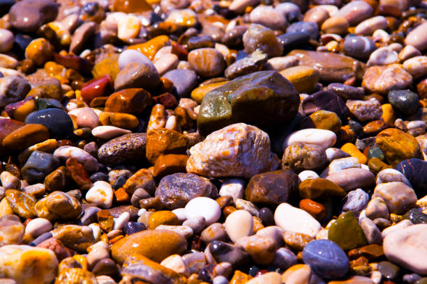 istock sea ​​stones wet beautiful background 1334153723