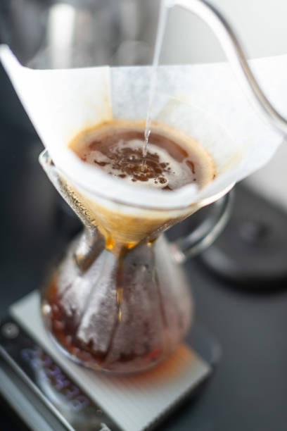 istock Home coffee preparation pourover style drip coffee slow coffee on kitchen counter 1334155183