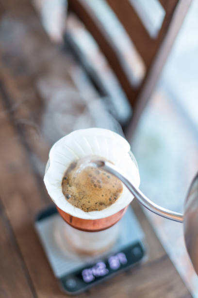 istock Home coffee preparation pourover style drip coffee slow coffee on kitchen counter 1334155185