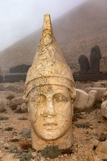 istock Head Statue at Nemrud Dagh with Fog 1334155207