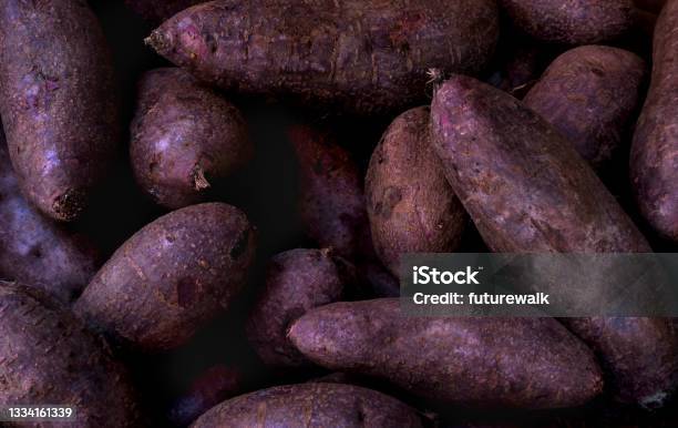 Purple Yams For Sale At A Market Stock Photo - Download Image Now - Purple Yam, Purple, Yam