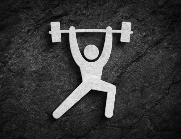 Barbell weightlifting training white symbol person lifting barbell symbol on dark stone wall background