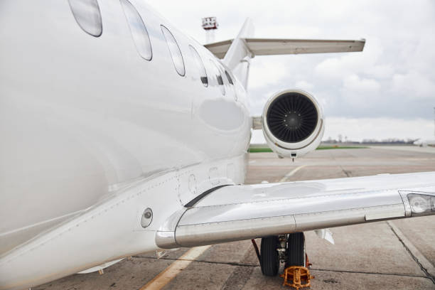 istock Business jet is standing on airport parking 1334162228