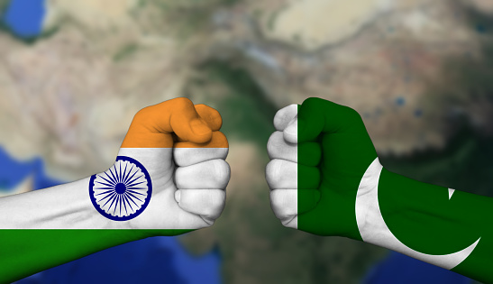 India vs, versus Pakistan. Conflict and tensions between India and Pakistan, geographical map in the background
