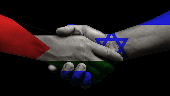 Israel and Palestine shake hands for future peace, black in the background