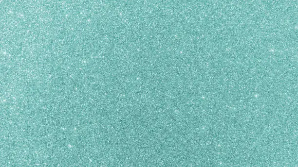 Photo of Teal green glitter periwinkle blue background texture sparkling shiny wrapping paper for holiday seasonal wallpaper decoration, greeting and wedding invitation card design element