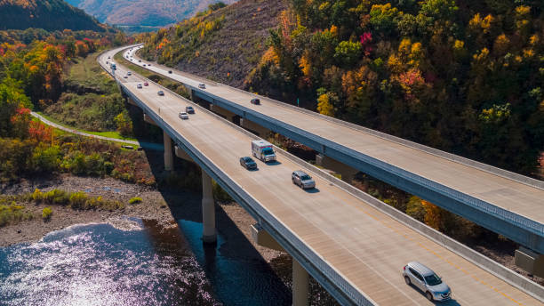 aerial view of the high bridge over the lehigh river at the pennsylvania turnpike on a sunny day in fall. - rapid appalachian mountains autumn water imagens e fotografias de stock
