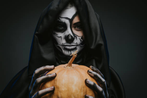 istock Mysterious death with pumpkin on Halloween Day 1334184912