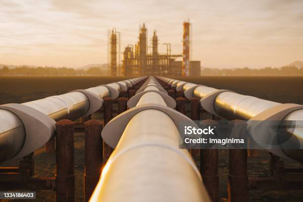 Oil Refinery And Pipeline In Desert During Sunset Stock Photo - Download Image Now - Natural Gas, Gas, Crude Oil