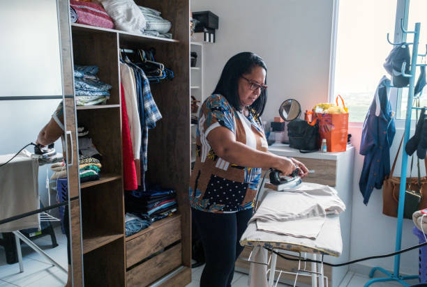 istock Brazilian woman ironing 1334193208