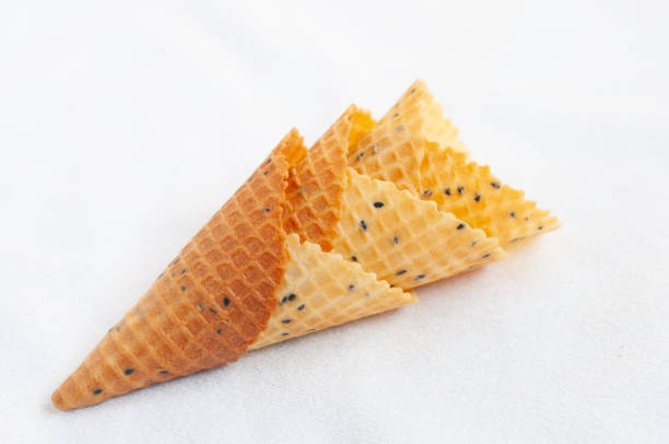 istock Isolated crispy ice cream cone with black sesame on white background. 1334194216