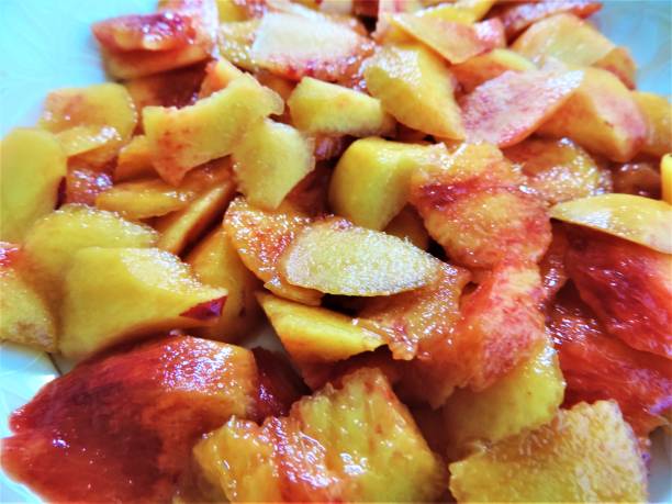 Slices of nectarines  for making of original dessert. Close-up.