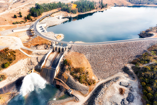 Jindabyne dam on Jindabyne lake and Snowy river in Snowy Hydro power generation scheme of Austraila - aerial view.