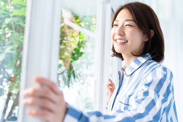 istock asian woman in night clothes 1334203144