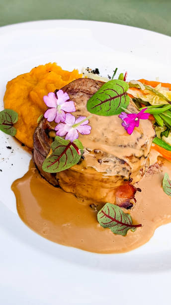 istock Bacon Wrapped Steak served with Sweet Potato Puree 1334209763