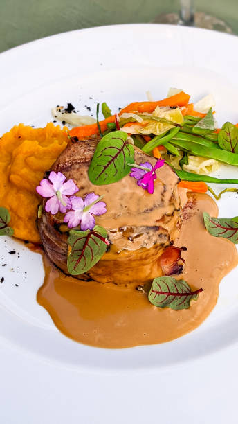 istock Floral Bacon Wrapped Tenderloin from Upscale Restaurant 1334209782